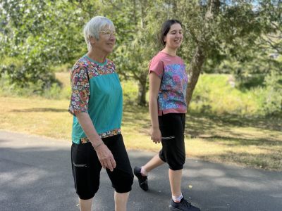 LivelifeMove - Movement Clothing 17 Move pant walking side view black with reflective zip. LiveLifeMove clothing 2 1 e1722567148680